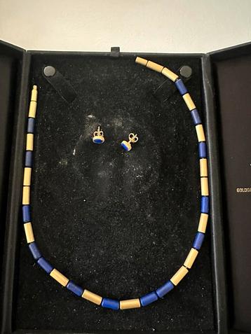 Antiek gouden getting met blauwe stenen beschikbaar voor biedingen
