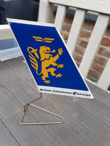 Vlag van het Brits-Caledonische vintage agentschap beschikbaar voor biedingen