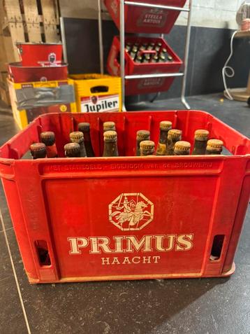 Oude bak primus met flesjes beschikbaar voor biedingen