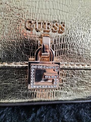 GUESS NIGHTFALL MINI CROSSBODYTAS GOUDMETALIC  beschikbaar voor biedingen