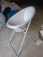 Baby bad op staander, Ophalen