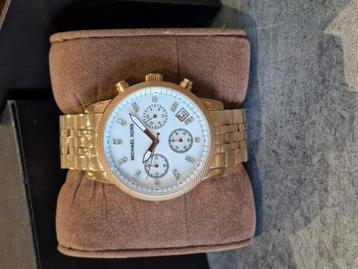 3 horloges , MK  , GUESS , RODANIA  ,  beschikbaar voor biedingen