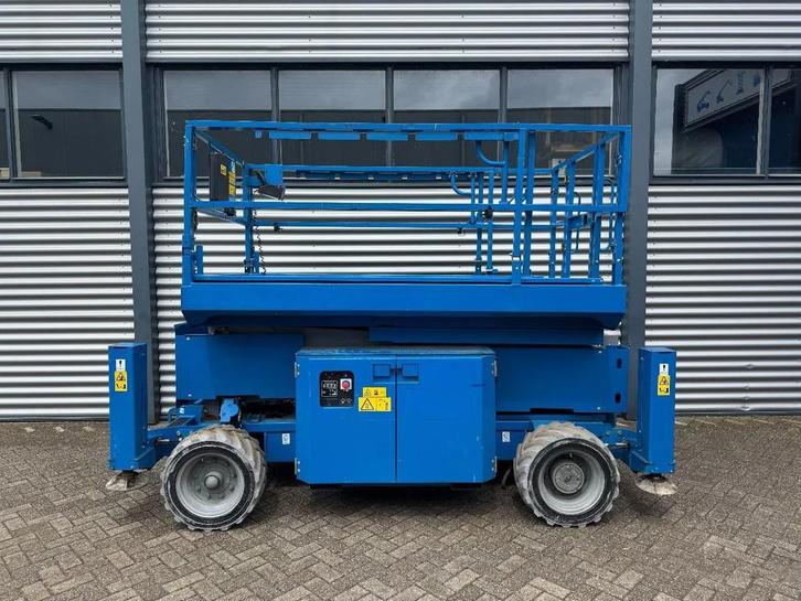 Genie GS2669DC Hoogwerker Schaarhoogwerker (bj 2013), Zakelijke goederen, Machines en Bouw | Liften, Steigers en Ladders