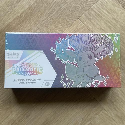 Pokémon TCG Prismatic Evolutions Super Premium Collection, Hobby en Vrije tijd, Verzamelkaartspellen | Pokémon, Verzenden