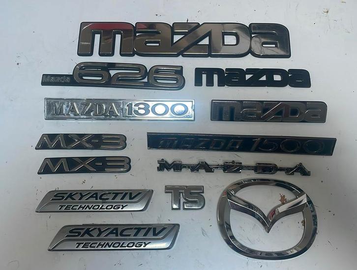Mazda emblemen jaren zeventig tot nu, Auto-onderdelen, Klein materiaal, Mazda, Gebruikt, Ophalen of Verzenden