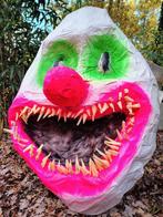 Clown papier-maché, Ophalen