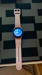 Samsung galaxy watch FE roze .met oplader, Handtassen en Accessoires, Smartwatches, Ophalen, Zo goed als nieuw, Waterdicht, Roze