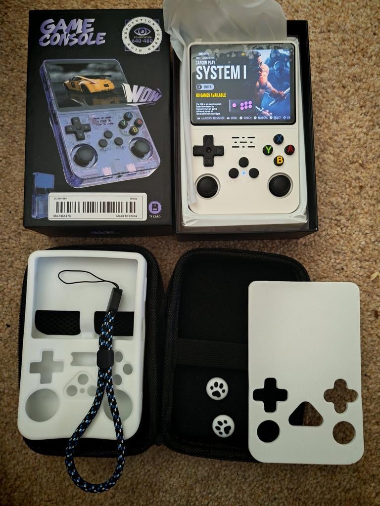 R36S nieuw met 47000 games en accesoires en cover, Games en Spelcomputers, Spelcomputers | Overige, Ophalen of Verzenden