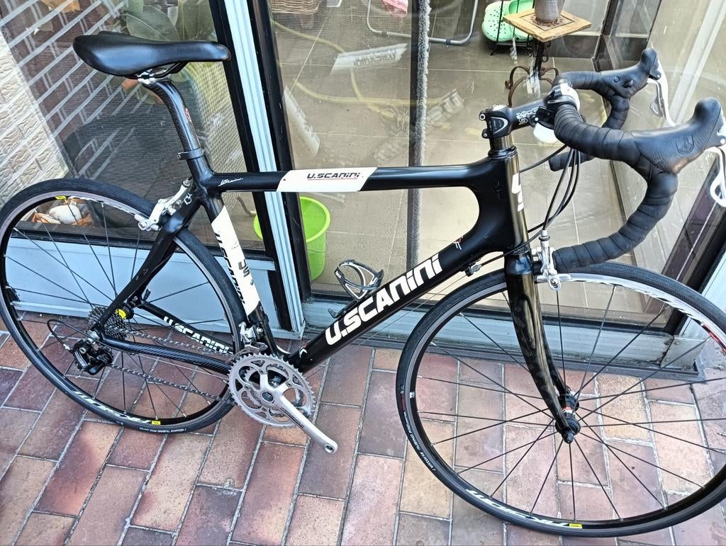 Carbon koersfiets uscanini, Ophalen