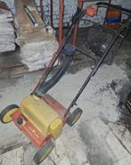 Verticuteer machine, Ophalen