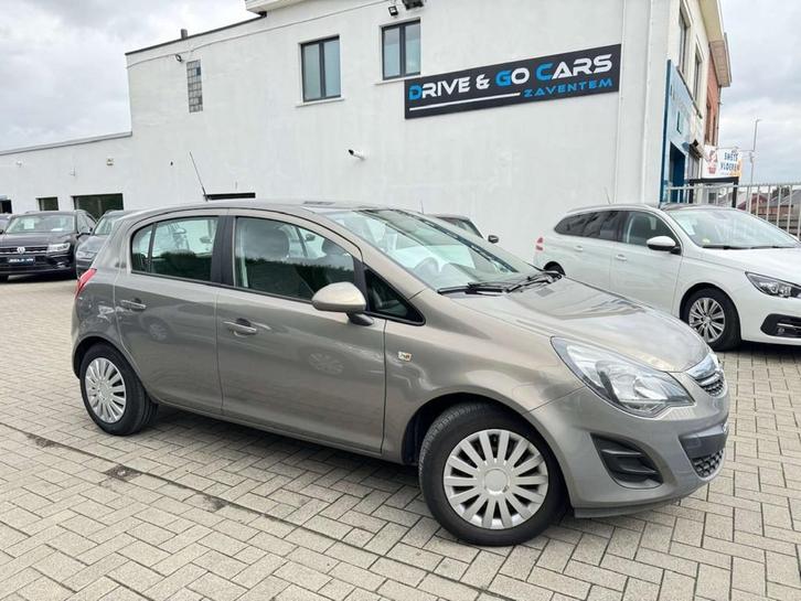 Opel Corsa 1.2i 16V Cosmo - Navigatie * 1 JAAR GARANTIE *, Auto's, Opel, Bedrijf, Te koop, Corsa, ABS, Airconditioning, Bluetooth