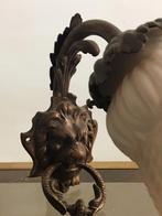 Bronzen wandlamp met leeuwenkop