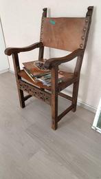 Oude stoel met leder, Ophalen