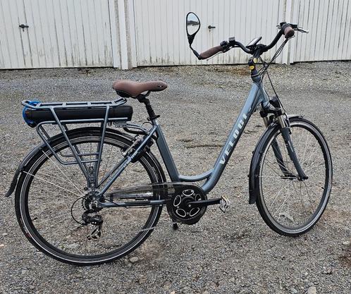 Vélo de ville Veloci électrique pour femmes à 7 vitesses, Vélos & Vélomoteurs, Vélos électriques, Utilisé, Veloretti, 30 à 50 km par batterie