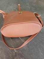 Handtas, Ophalen, Handtas