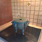 decoratief oosters geinspireerde bronzen pot, Enlèvement