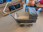 Kinderwagen pop, Ophalen