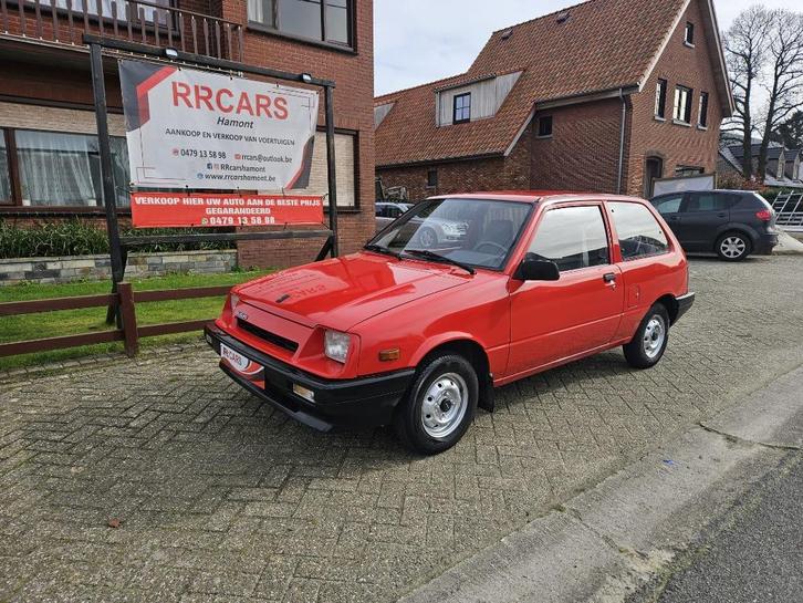 SUZUKI SWIFT GA/OLDTIMER/1988/AUTOM/58dKM/NIEUWST/, Auto's, Suzuki, Bedrijf, Te koop, Swift, Lederen bekleding, Radio, Benzine