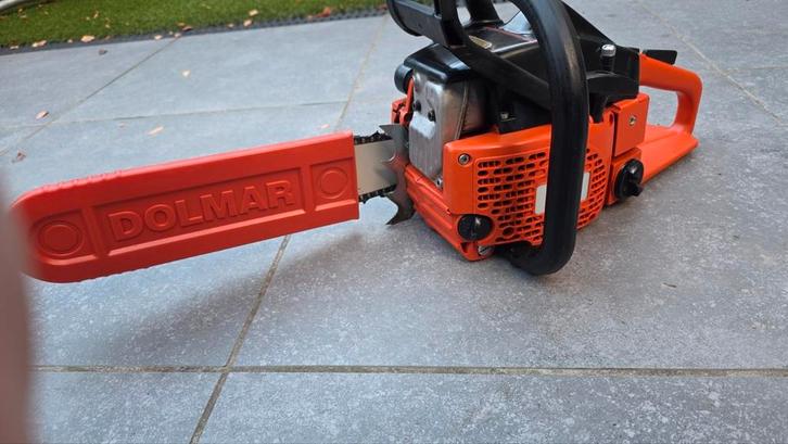 Kettingzaag Dolamr 109 in prima staat., Tuin en Terras, Hand-tuingereedschap, Zo goed als nieuw, Ophalen