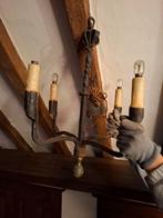 antieke smeedijzeren luster, Ophalen