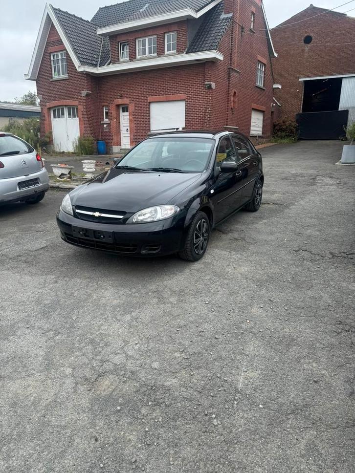 Chevrolet lacetti 1.4 70kw km62850 bj2006airco 1jaar garanti, Auto's, Chevrolet, Bedrijf, Te koop, Lacetti, ABS, Airbags, Airconditioning