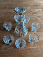 Glazen karaf me borrelglaasjes en gouden rand, Enlèvement