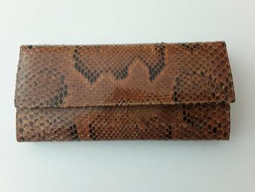 Nieuw vintage slangenzakje beschikbaar voor biedingen
