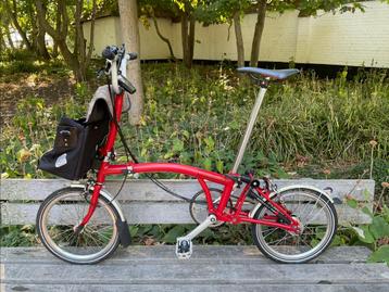 Rode Brompton vouwfiets M6L met extra accessoires beschikbaar voor biedingen