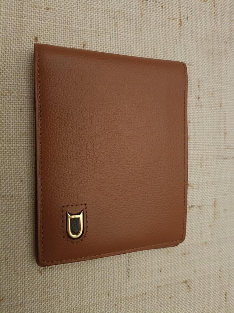 Delvaux portefuille, Enlèvement