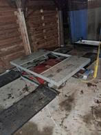 Poetsbrug op perslucht met oprijplaten, Ophalen