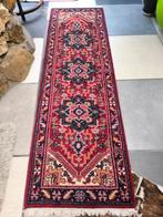 Handgemaakte Perzisch tapijt, Ophalen