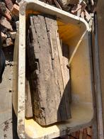 Stukken eiken balken, Ophalen