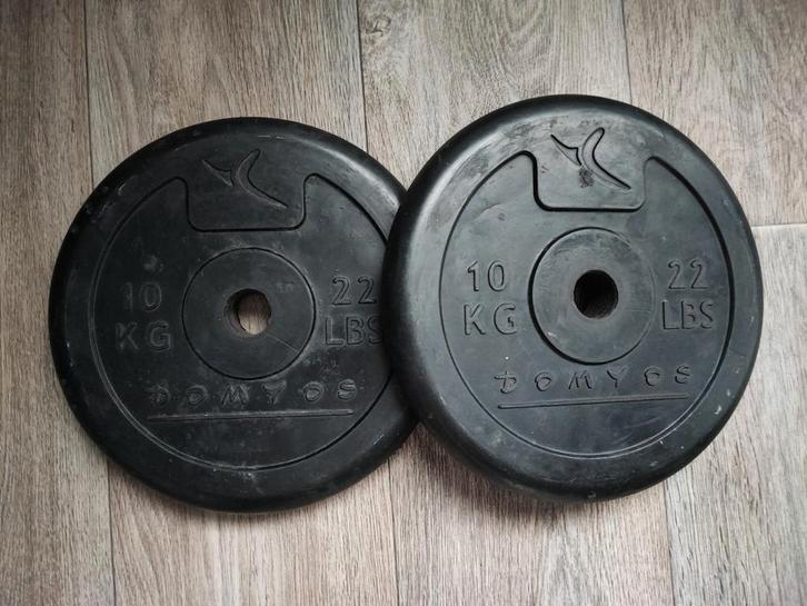2 x 10kg Domyos halterschijven. (20kg), Sport en Fitness, Fitnessmaterialen, Gebruikt, Halterschijven, Armen, Benen, Borst, Buik