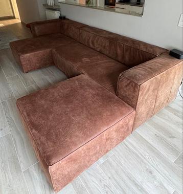 Lederen cognac hoekzetel beschikbaar voor biedingen