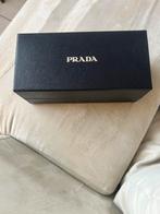 Prada doos, Ophalen, Zo goed als nieuw