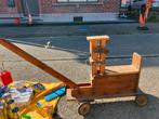 Houten kraanwagen, Ophalen
