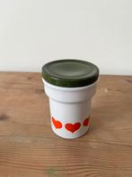 Pot met hartjes, Ophalen