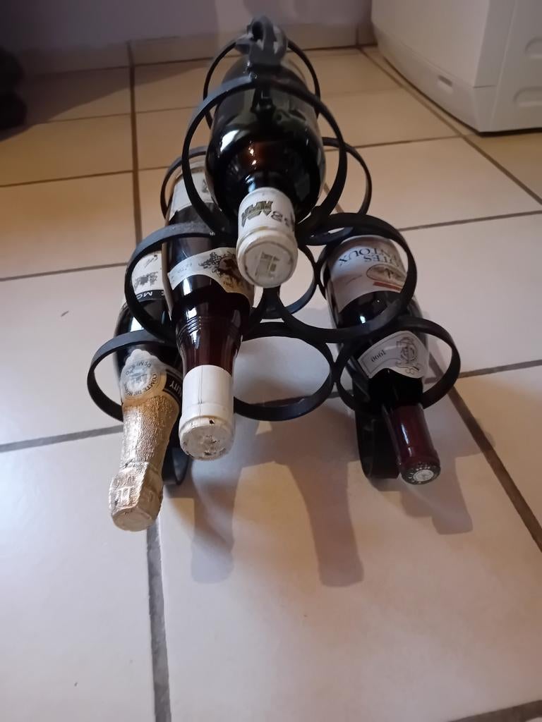 Gietijzeren wijnrek, Ophalen