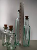 Set met 4 flessen in recycled glas, Ophalen of Verzenden, Zo goed als nieuw, Glas, Overige typen