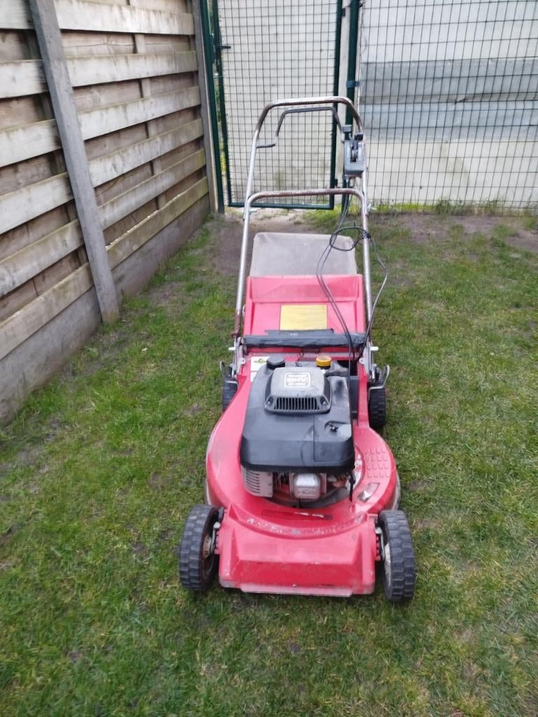 Kawasaki grasmaaier met aluminium maaidek benzine, Enlèvement