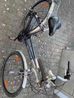 Damesfiets van het merk Merdina, Ophalen
