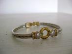Armband zilverkleur en goudkleur, Ophalen of Verzenden