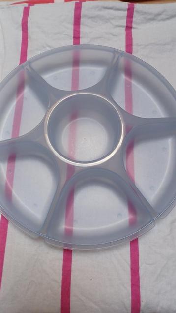 Tupperware aperitiefschaal, Enlèvement