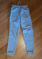 Lichtgrijze joggingbroek 134-140, Kinderen en Baby's, Kinderkleding | Maat 134, Broek, Zeeman, Gebruikt, Jongen of Meisje