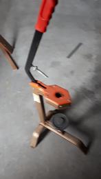 Botteltoestel stopselmachine, Ophalen