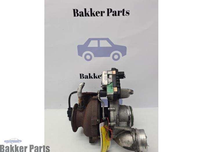 Turbo d'un BMW 7-Serie, Autos : Pièces & Accessoires, Moteurs & Accessoires, BMW, Utilisé, 3 mois de garantie