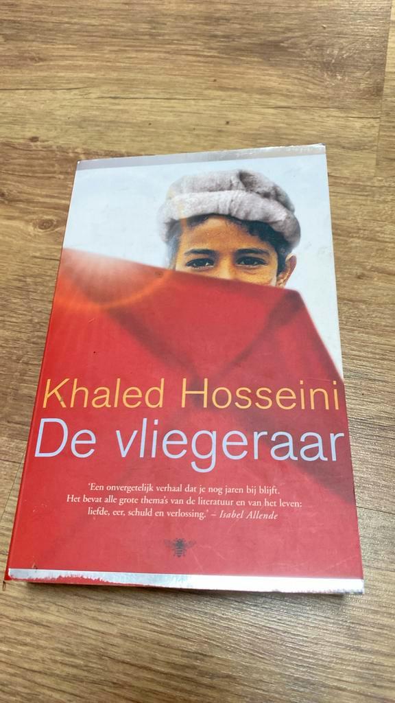 Khaled Hosseini - De vliegeraar, Boeken, Literatuur, Zo goed als nieuw, Ophalen of Verzenden