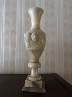 Albast vaas, Ophalen