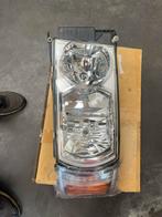 Scania koplamp links met pinker, Ophalen