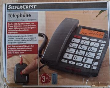 Senioren telefoon toestel met alarm knop beschikbaar voor biedingen